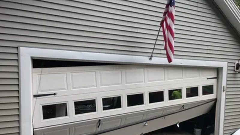 Collapsed garage door before emergency repair — Los Angeles
